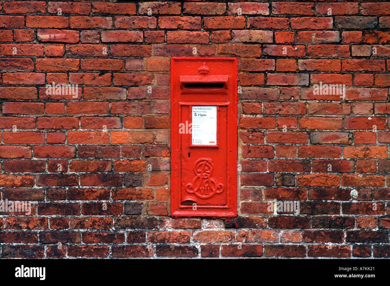 Post box in brick wall Codsall Staffordshire Stock Photo