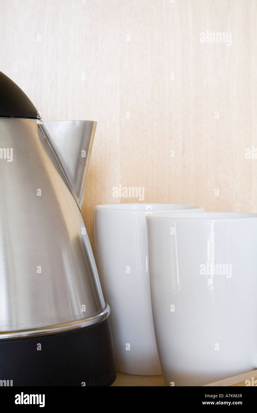 Kettle and mugs on a wooden tray in a hotel room Stock Photo Alamy