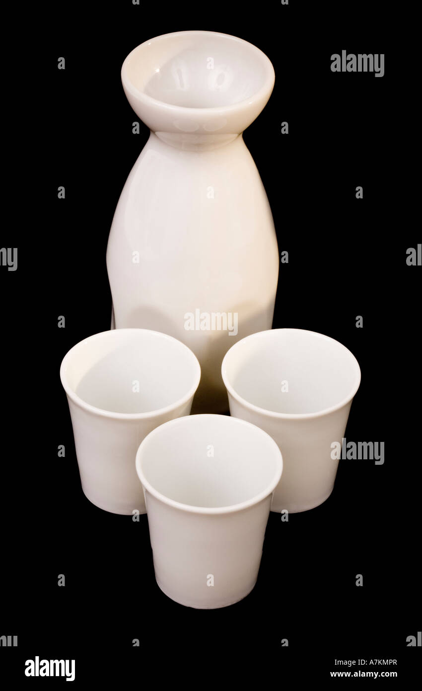 Sake serving set isolated on black Stock Photo Alamy
