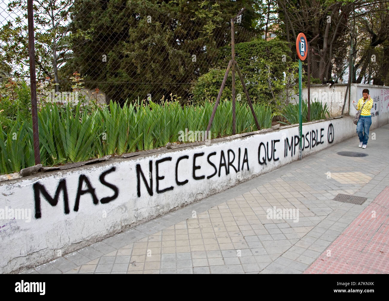 Mas necesario que imposible graffiti with anarchy symbol Granada Spain Stock Photo