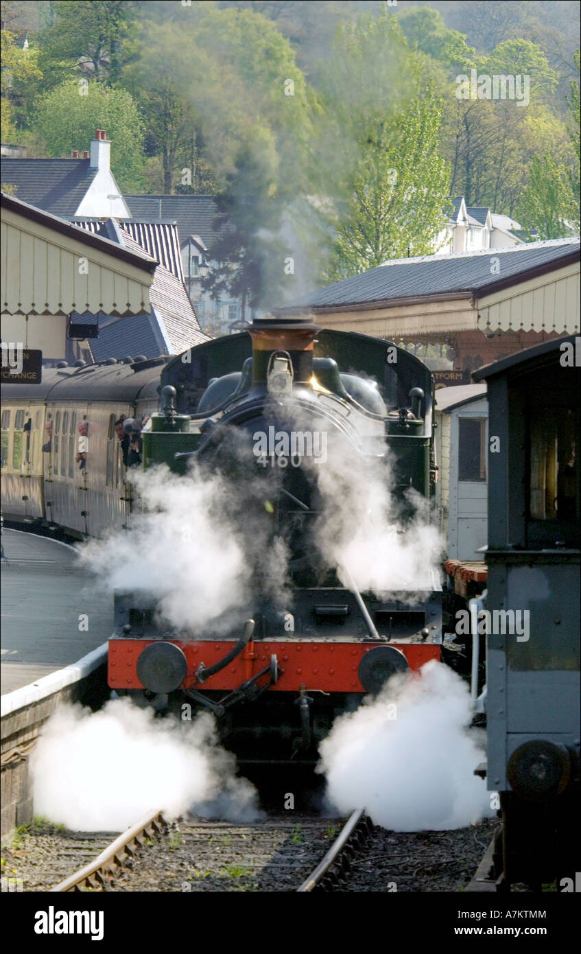 A steam train waits at Llangollen station on the Llangollen heritage railway. Stock Photo