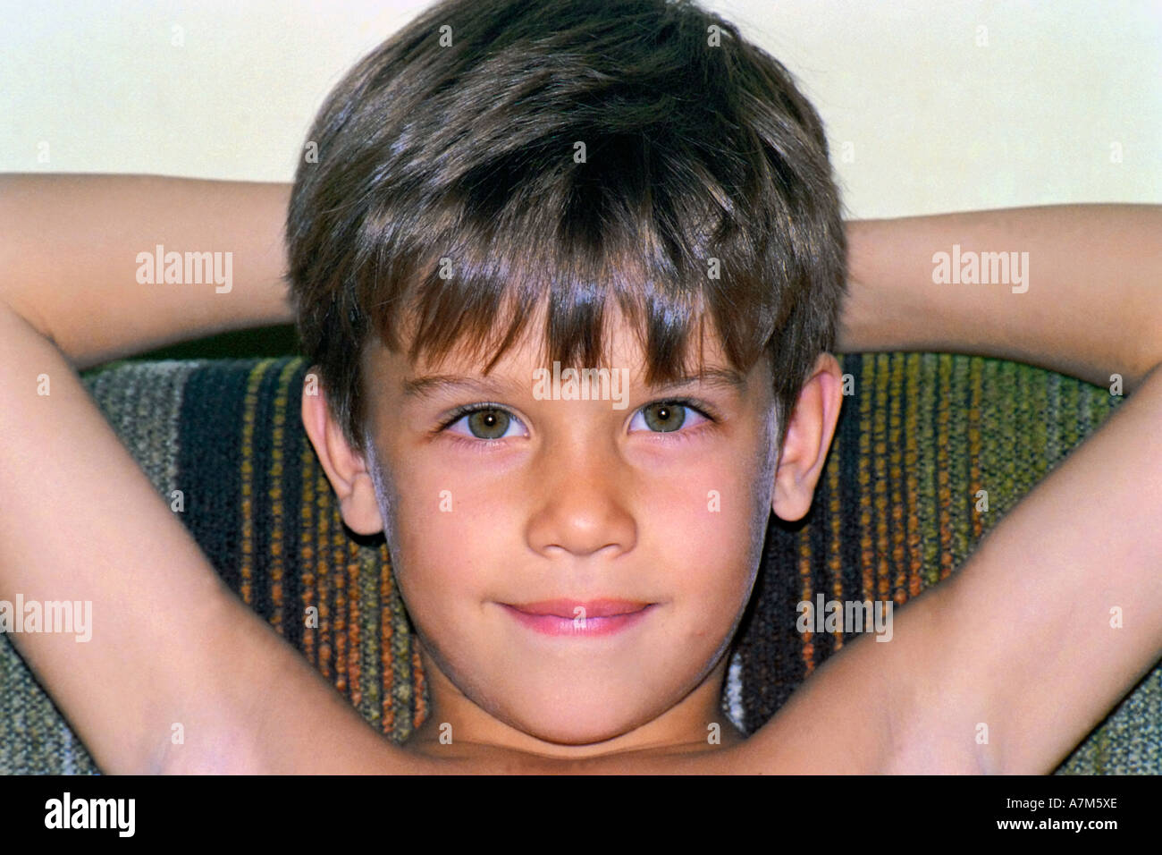 Close up of a young Boy looking Stock Photo - Alamy