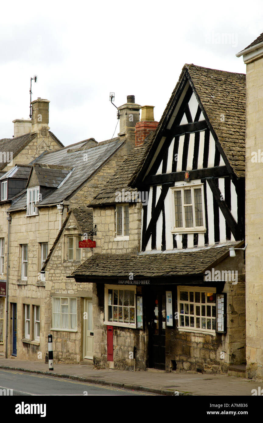 Post Office and main street Painswick Gloucestershire England UK Cotwold stone and timber buildings Stock Photo