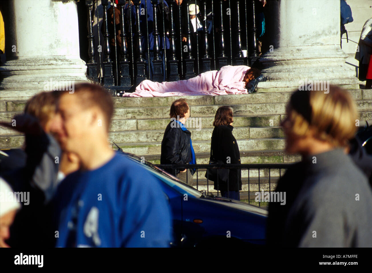 homeless person sleeping on steps london  Stock Photo
