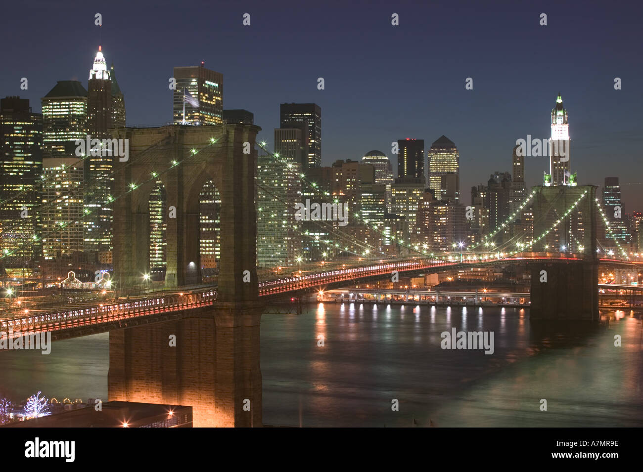 USA, New York, New York City, Manhattan: Aerial Evening View of Brooklyn Bridge & Lower Manhattan from Brooklyn Stock Photo