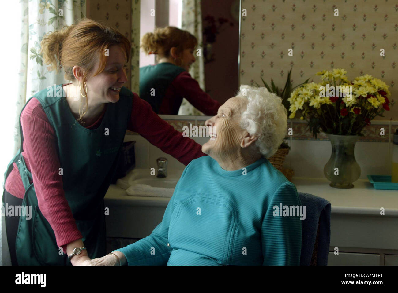 Carer in an old peoples home hi-res stock photography and images - Alamy