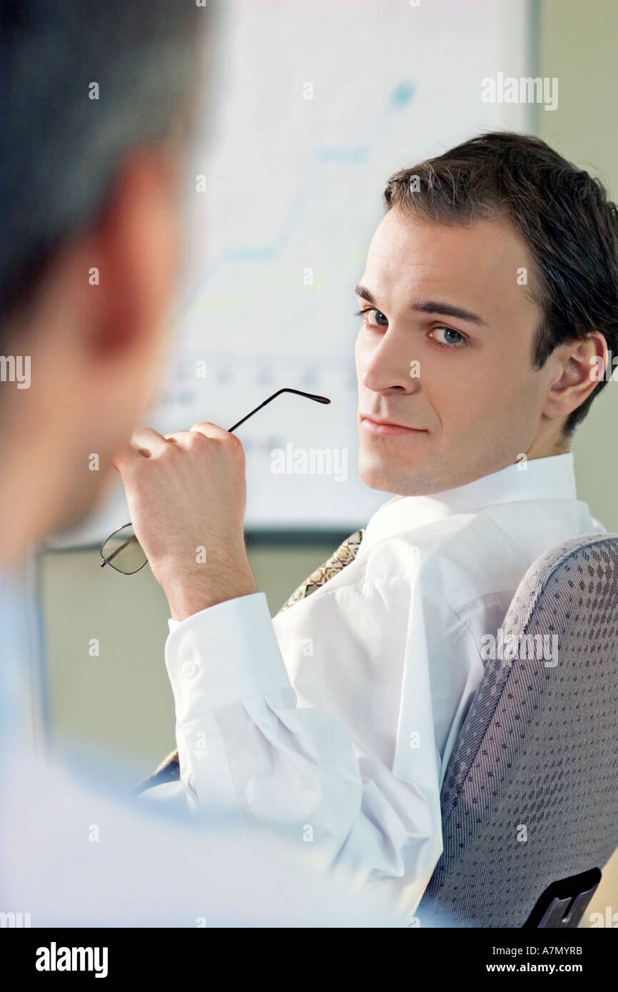 Two men sitting in the office. Stock Photo