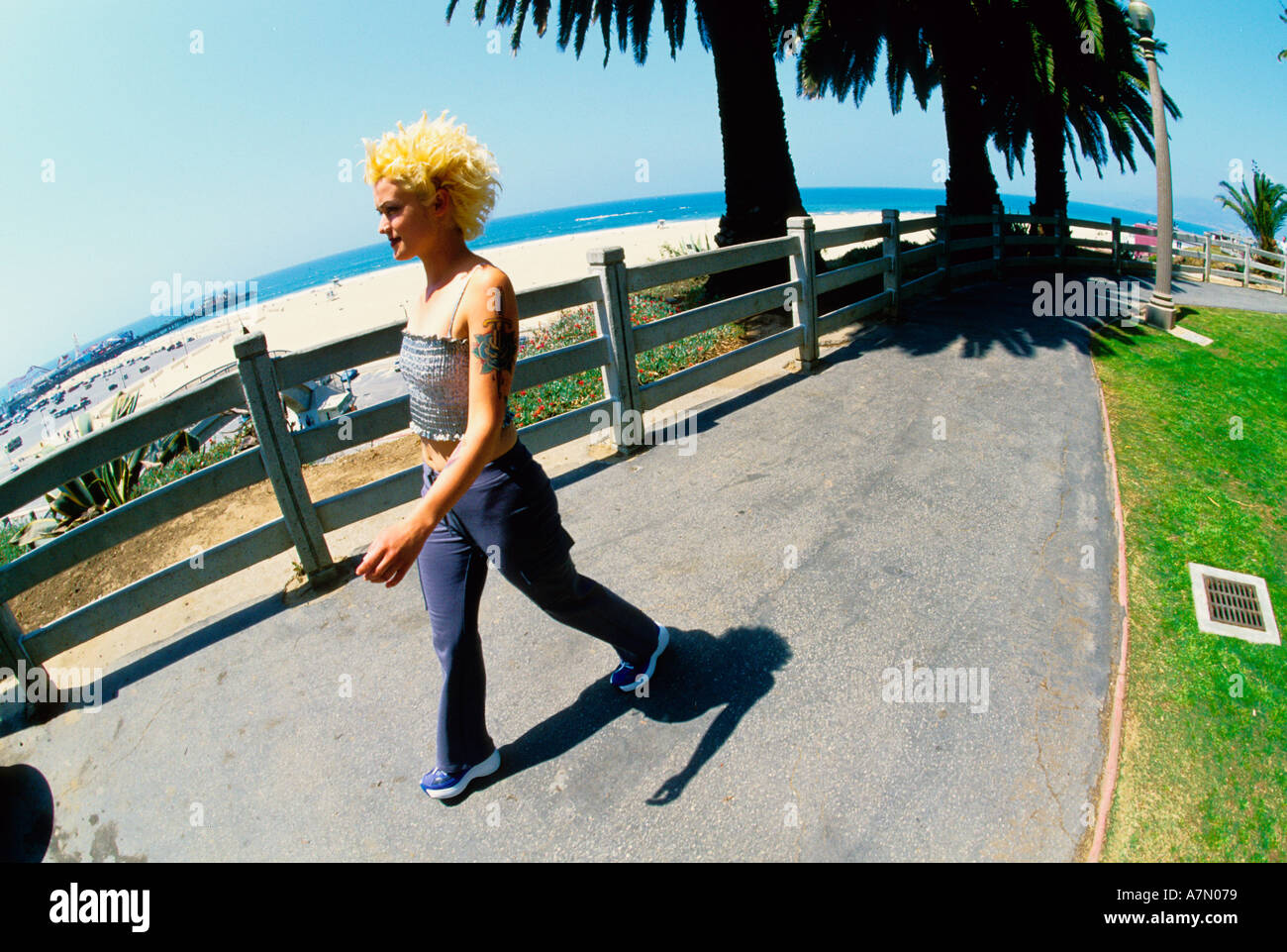 a punk girl walking Stock Photo - Alamy