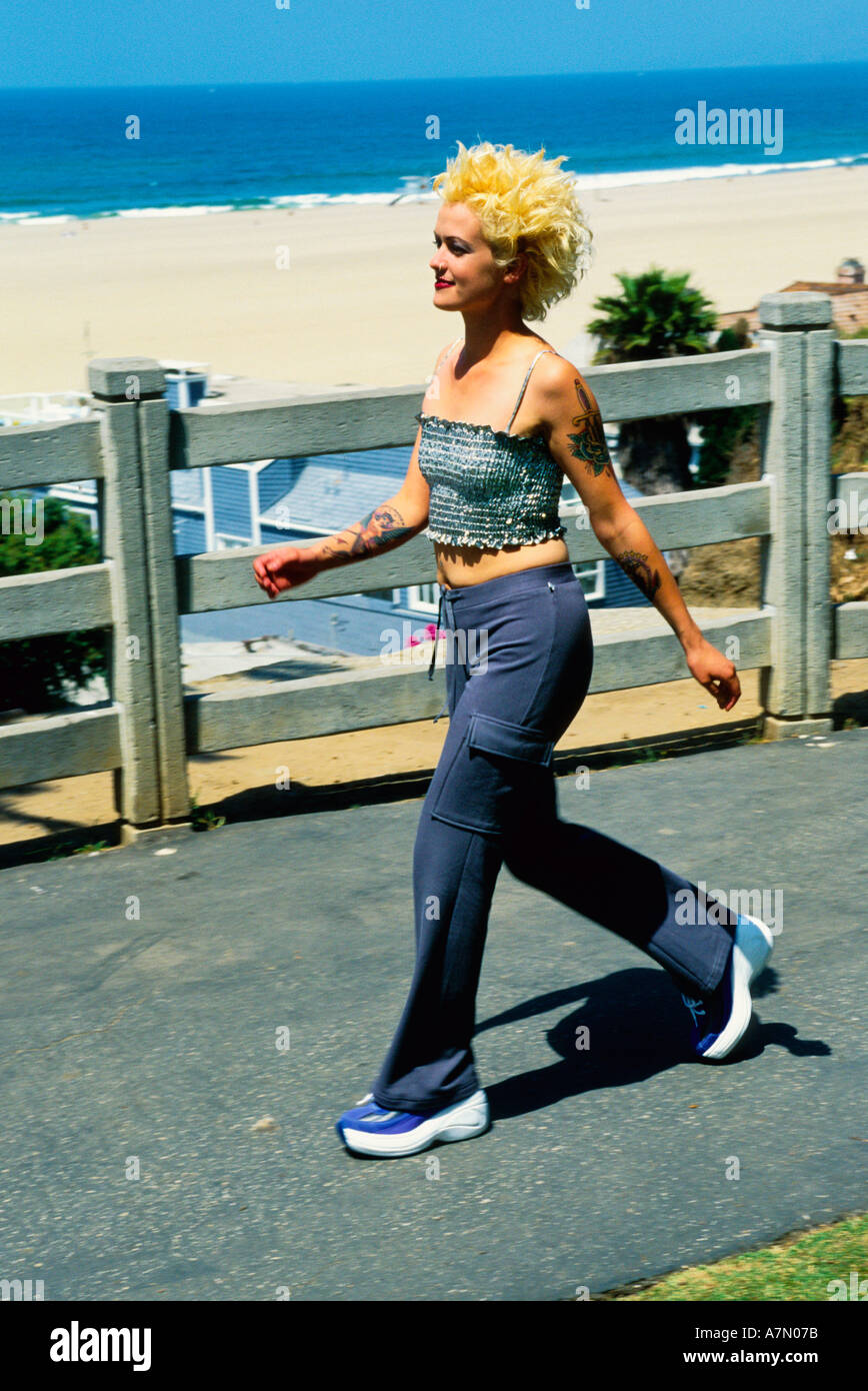 a punk girl walking Stock Photo - Alamy