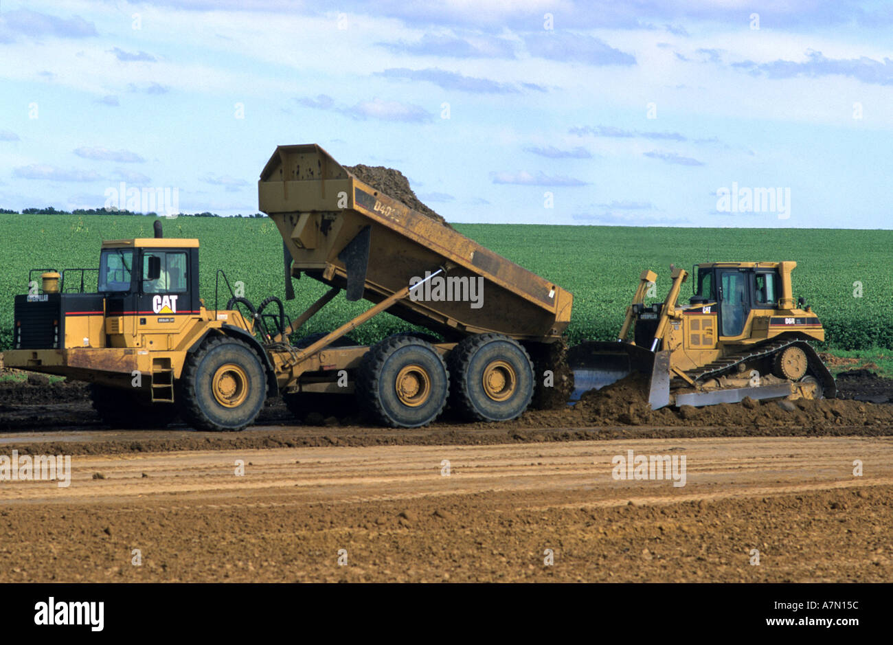 Earthmovers doing road construction along state highway 60 in Northwest Iowa  Stock Photo