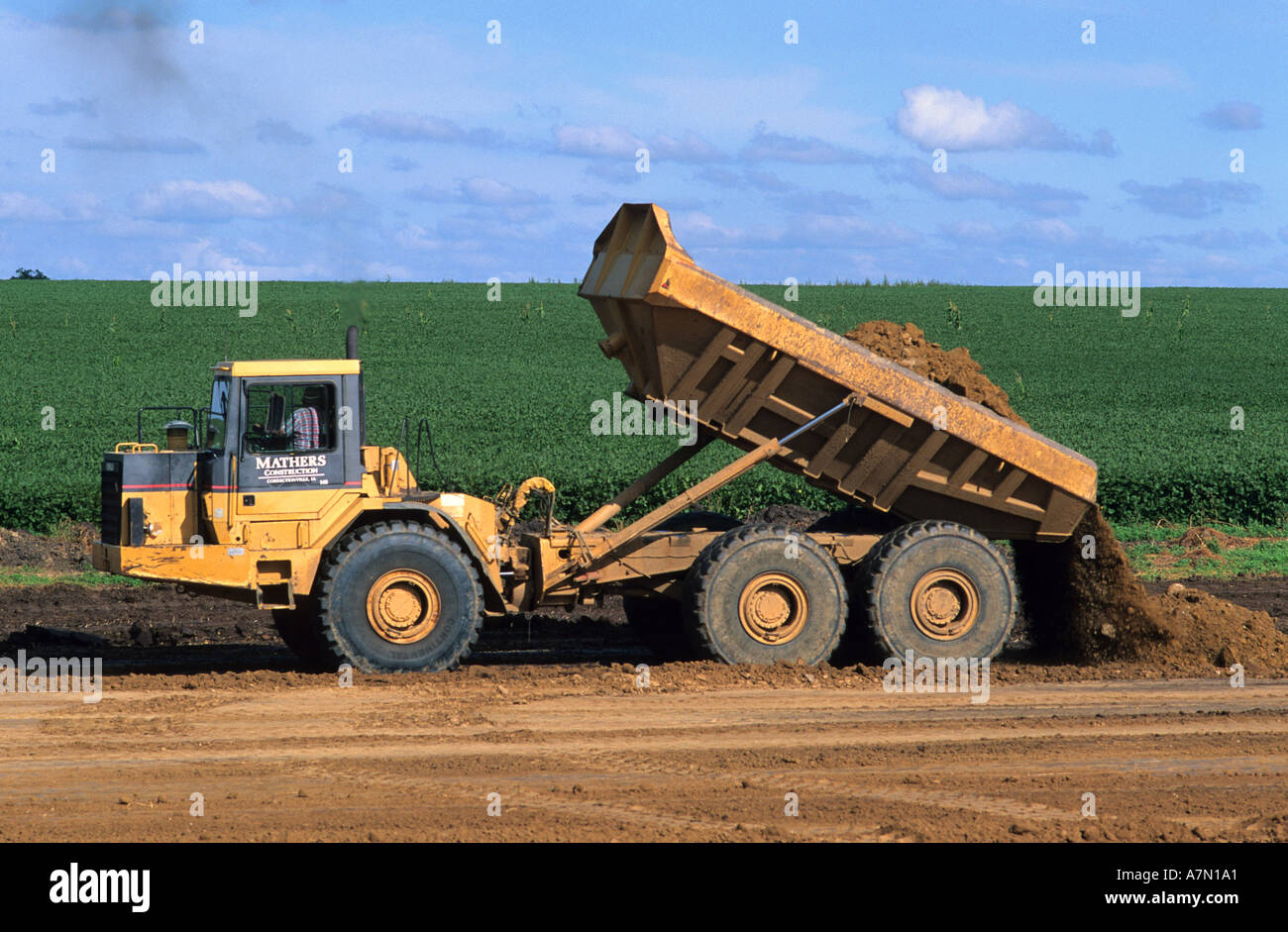 Construction dump truck at road construction along state highway 60 in Northwest Iowa  Stock Photo