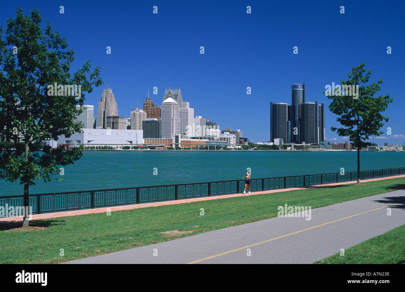A view of the Detroit Michigan skyline taken from Windsor Ontario Canada with the Detroit river in the foreground  Stock Photo