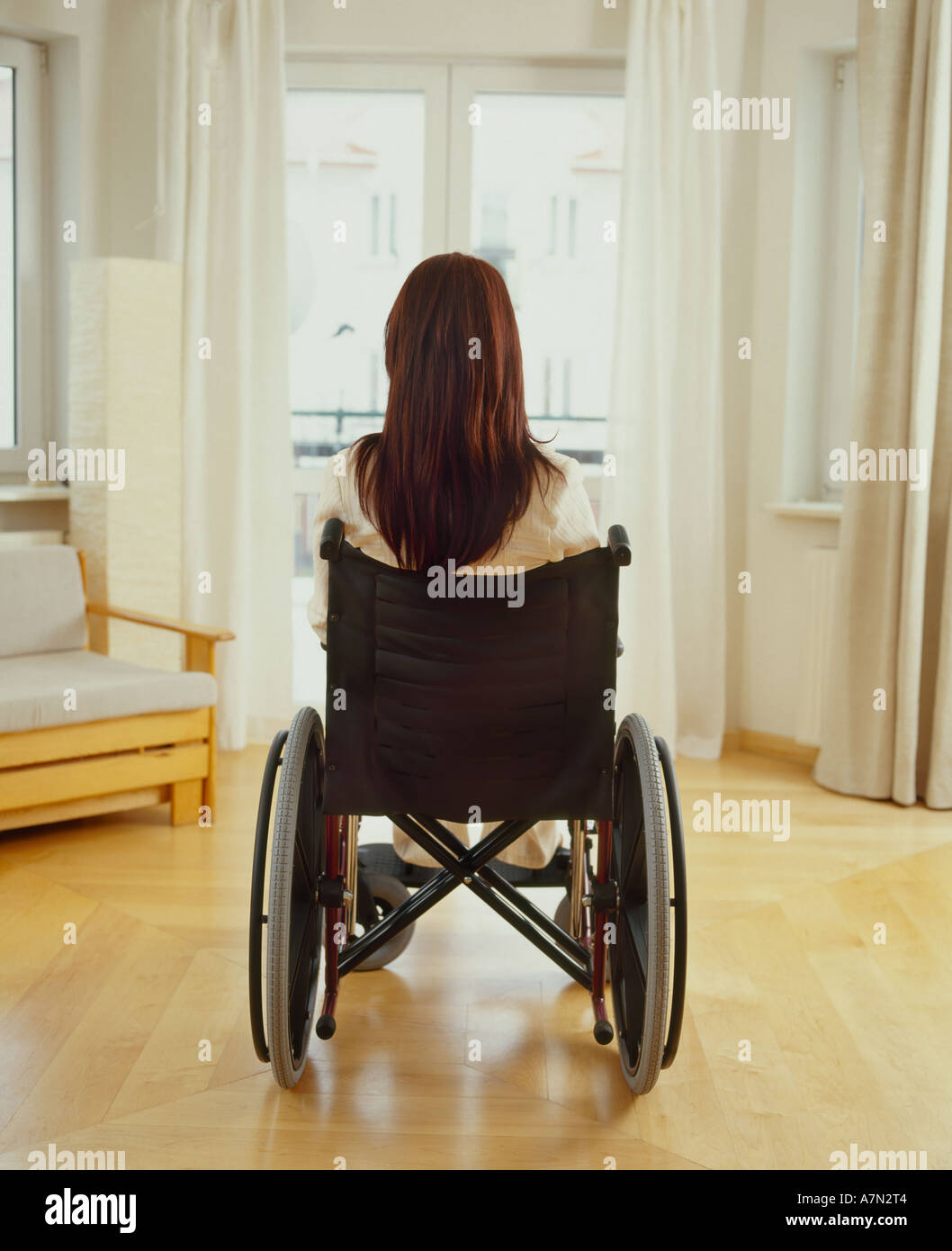 indoor flat room livingroom woman young girl long hair sit