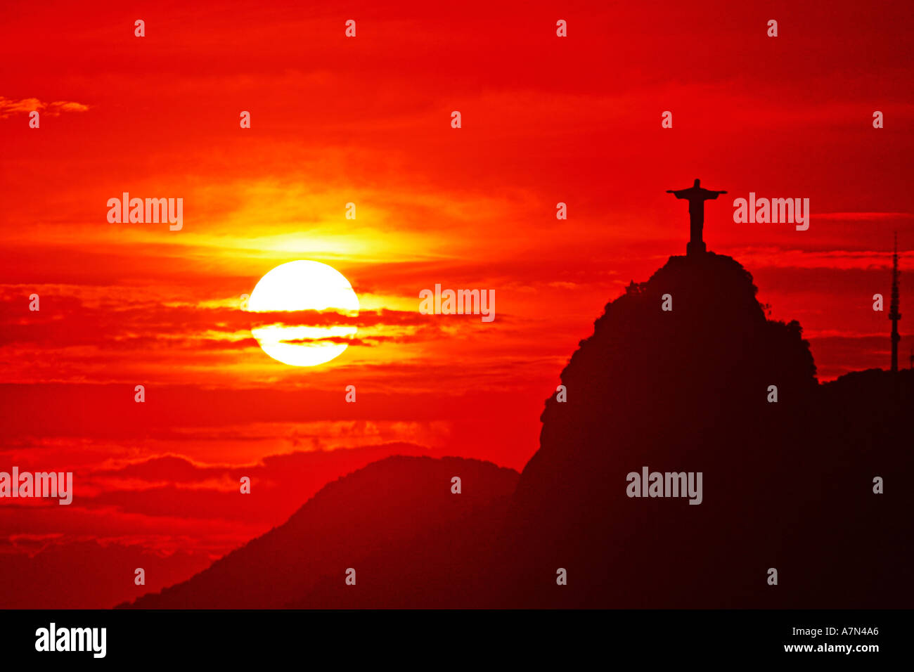 Brasil Rio de Janeiro Corcovado Hill Christ Statue Cristo Redentor on top at sunset, view from sugarloaf mountain Stock Photo