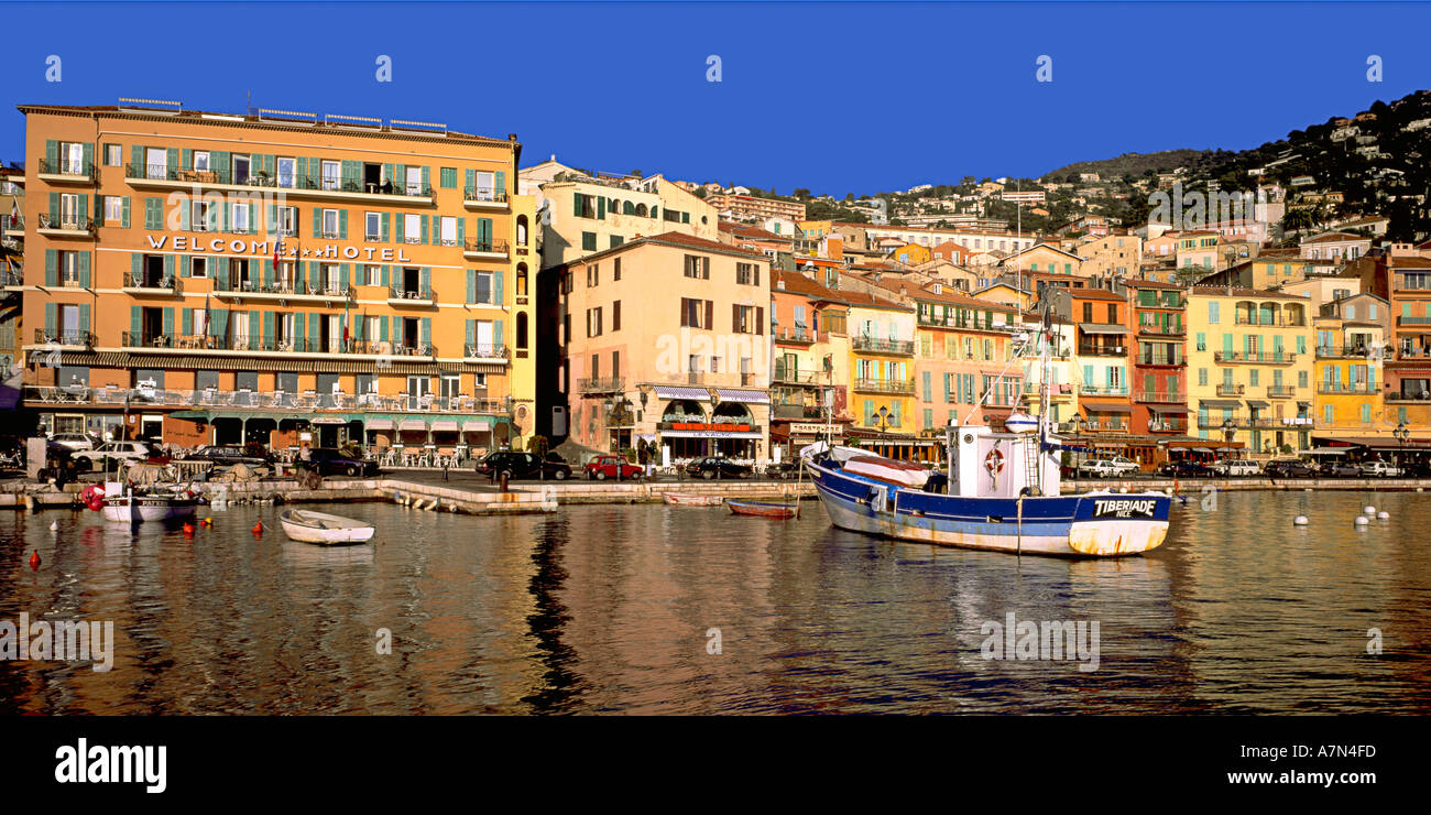 South France , Villefranche sur Mer little harbour fishing boat promenade with exellant fish restaurants blue sky Stock Photo