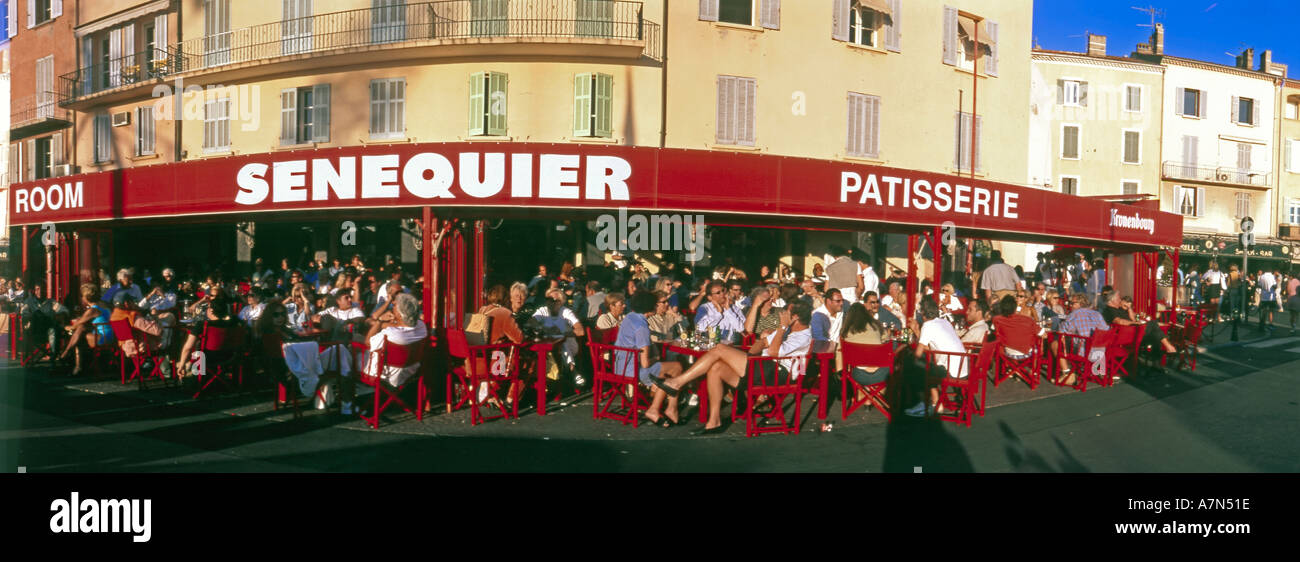 France St Tropez Cafe de Senequier terasse people harbour view Stock Photo