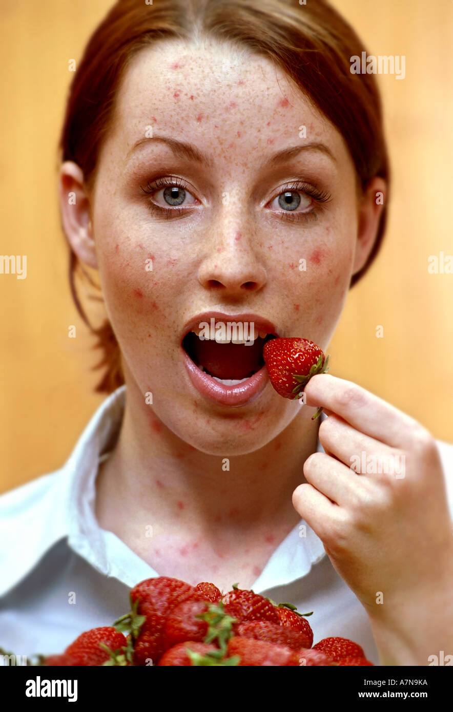 indoor studio woman young girl 20 25 red hair long freckle freckles
