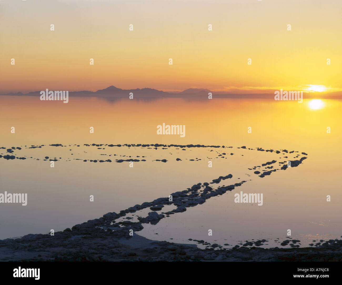 UT, US, Spiral Jetty above water of Great Salt Lake, Rozelle Point. Earthwork created by Robert Smithson in 1970. Stock Photo