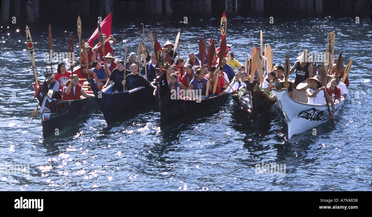 Tribal canoes greeting ceremony at Elliot Bay; Seattle Salmon Homecoming Celebration Stock Photo