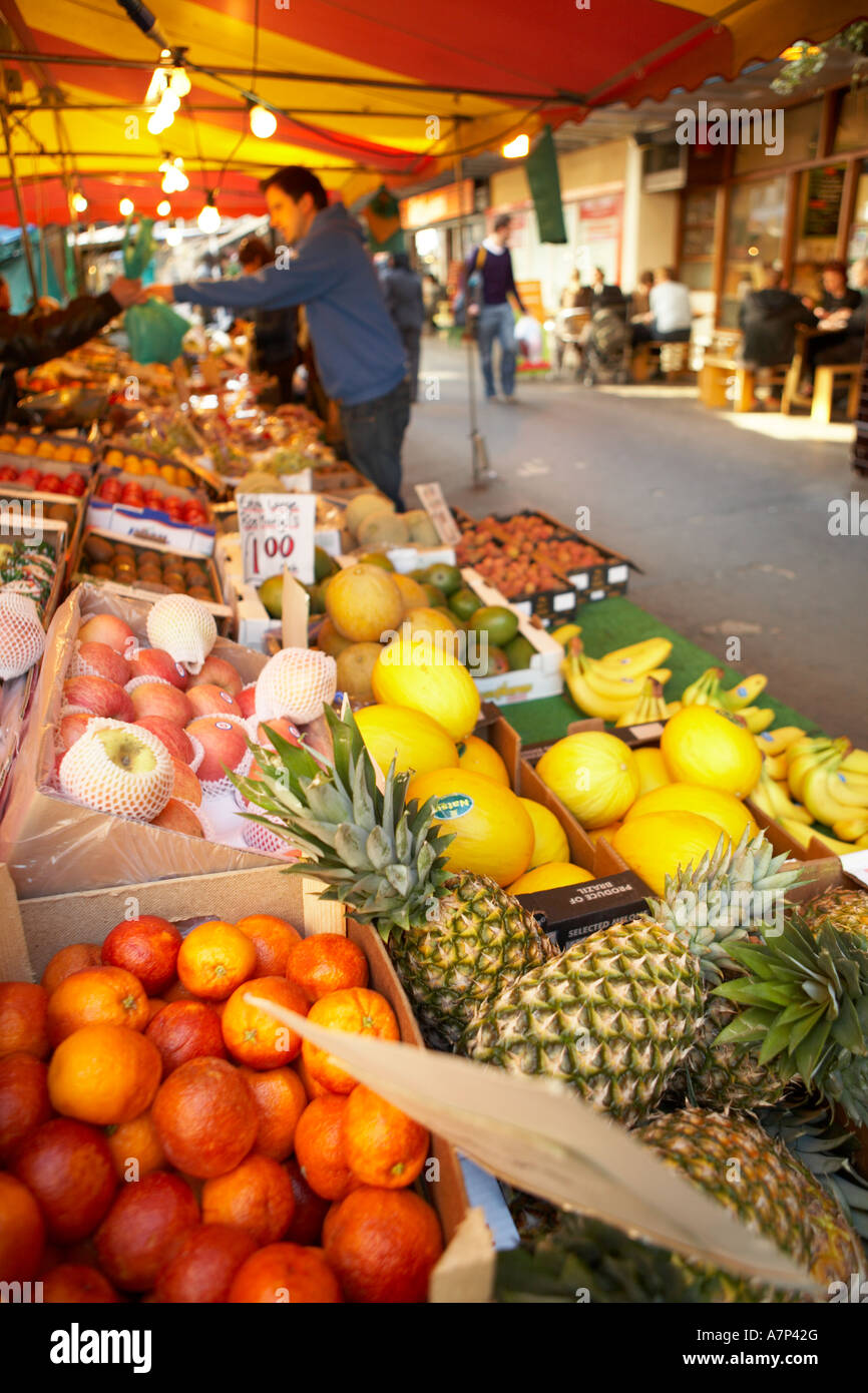 Fruit and veg stall at a Soho outdoor market in London city England UK