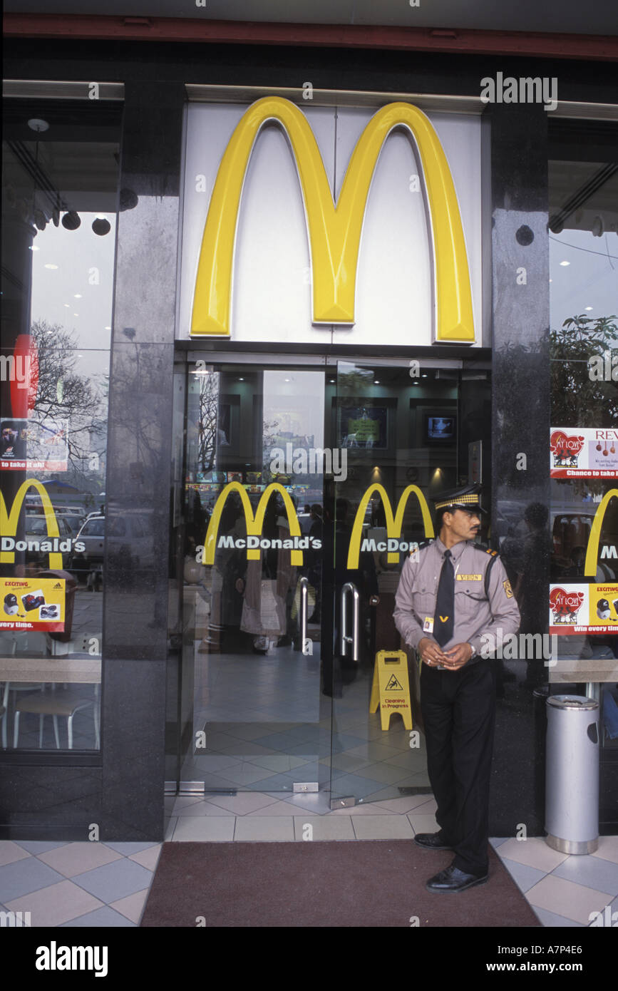 Security guard outside a Macdonalds fast food restaurant in Delhi Stock ...