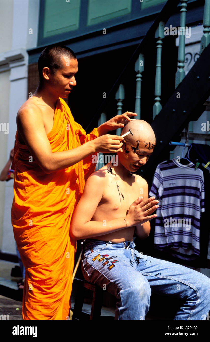 Buddhist monk shaving head hi-res stock photography and images - Alamy