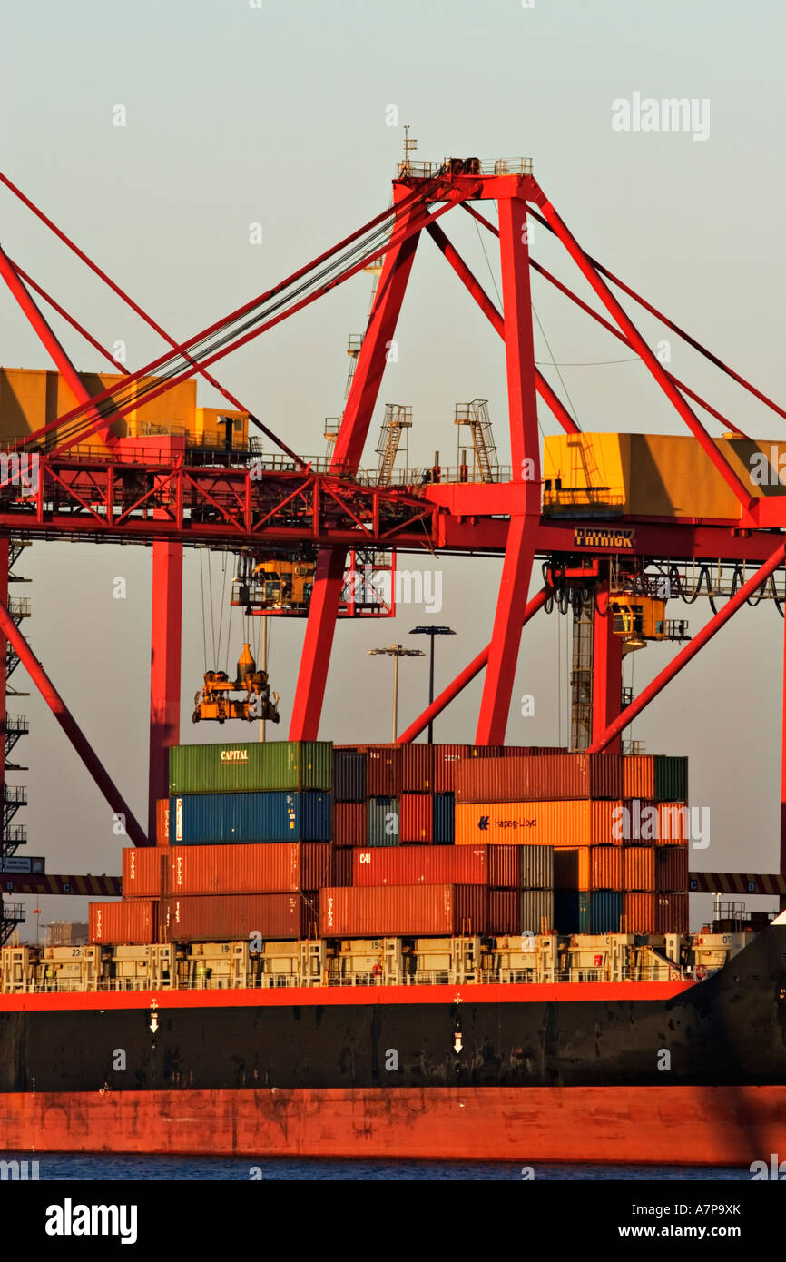 Shipping Industry / A container ship unloads its containers in the