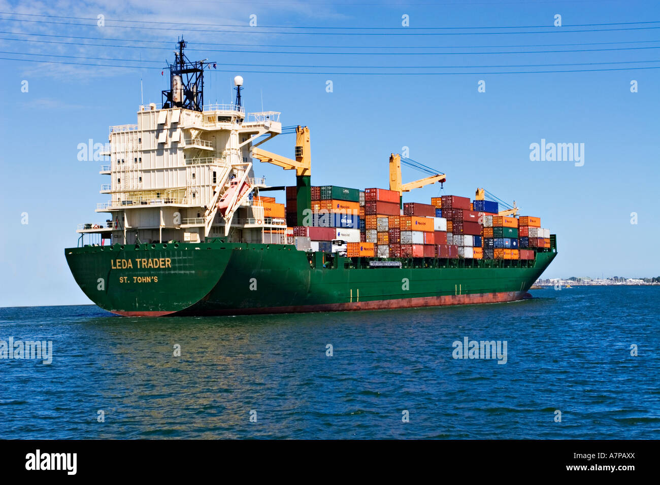 Shipping Industry / A container ship is outbound in the "Port of