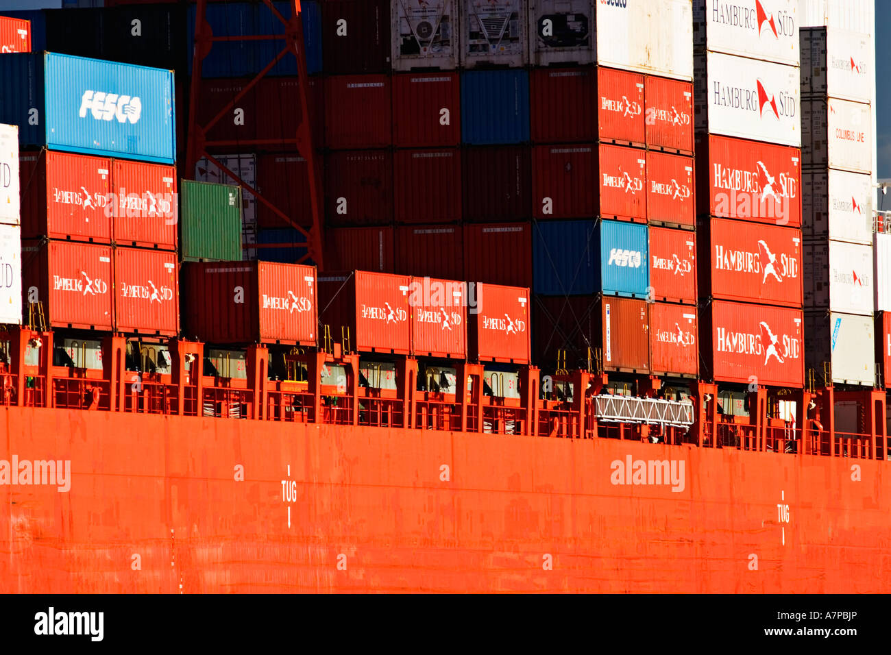 Shipping Industry / Shipping Containers stacked  on the deck of a Container Ship.'Port of Melbourne' Australia. Stock Photo