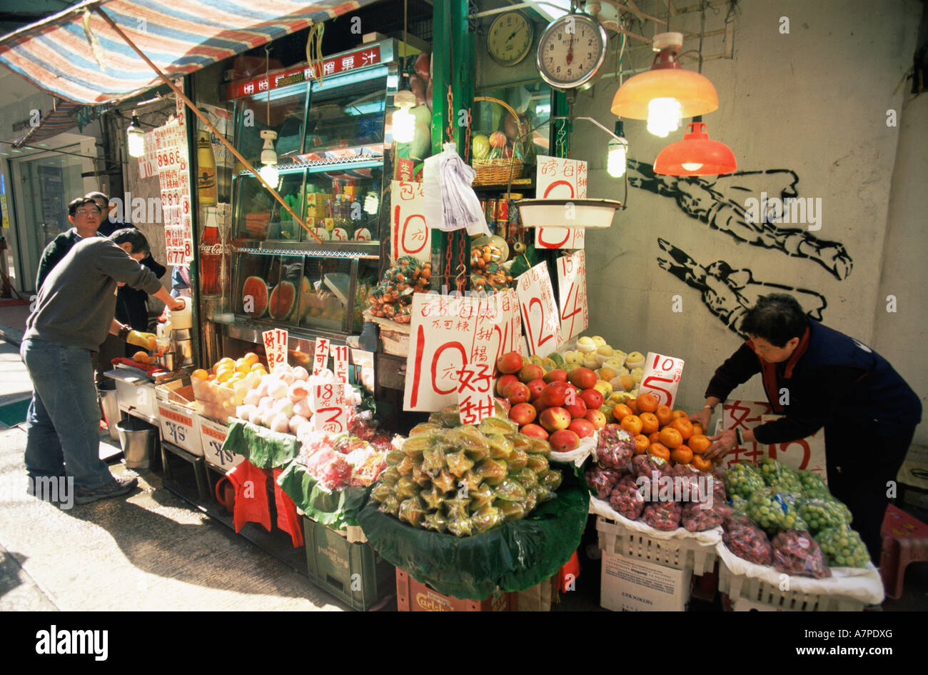 China, Hong Kong, Typical Streetside Fresh Fruit Juice Stall Stock