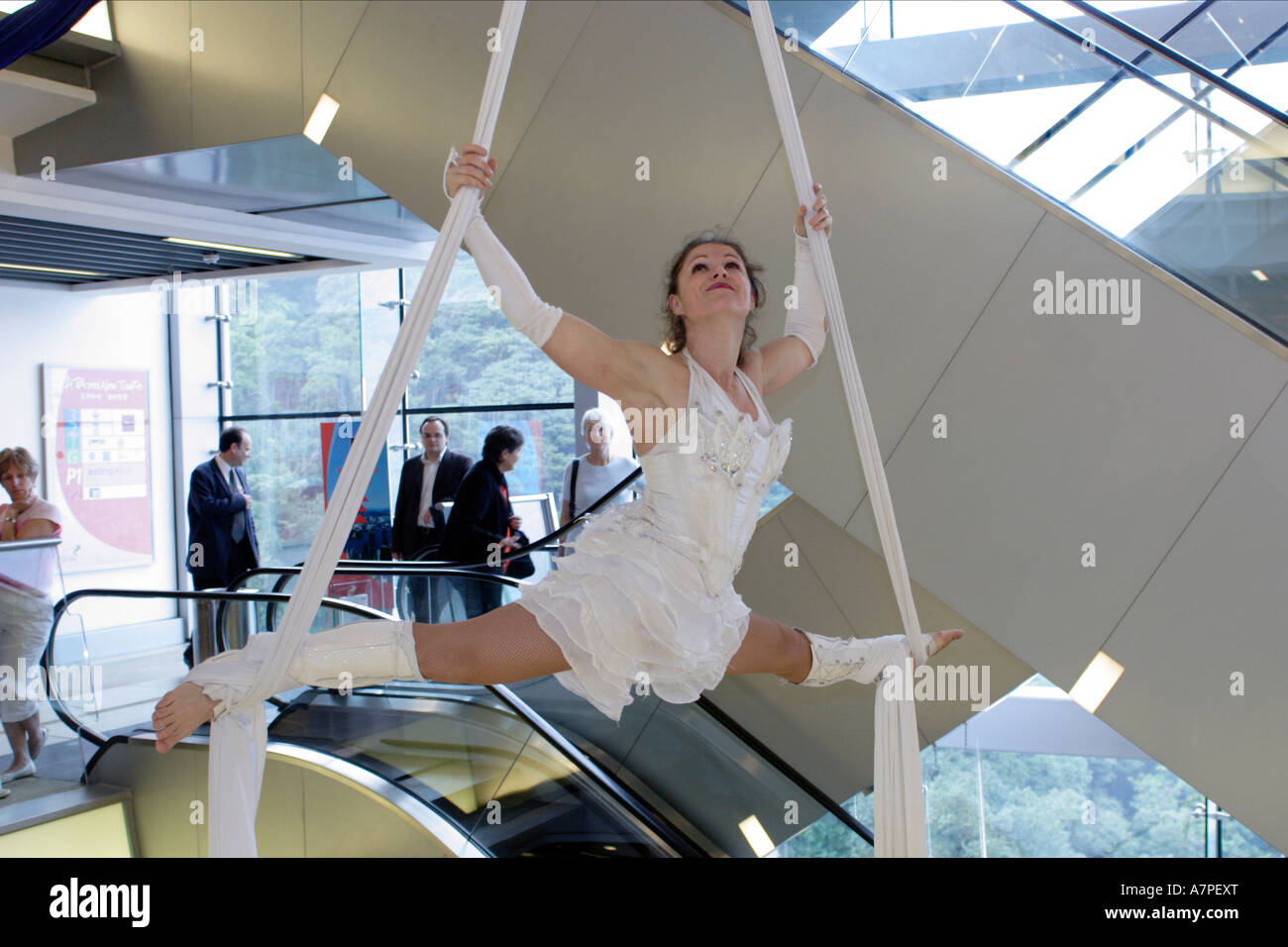 Acrobat Performs Acrobat performs in mall on top of Victoria Peak in Hong Kong Stock ...