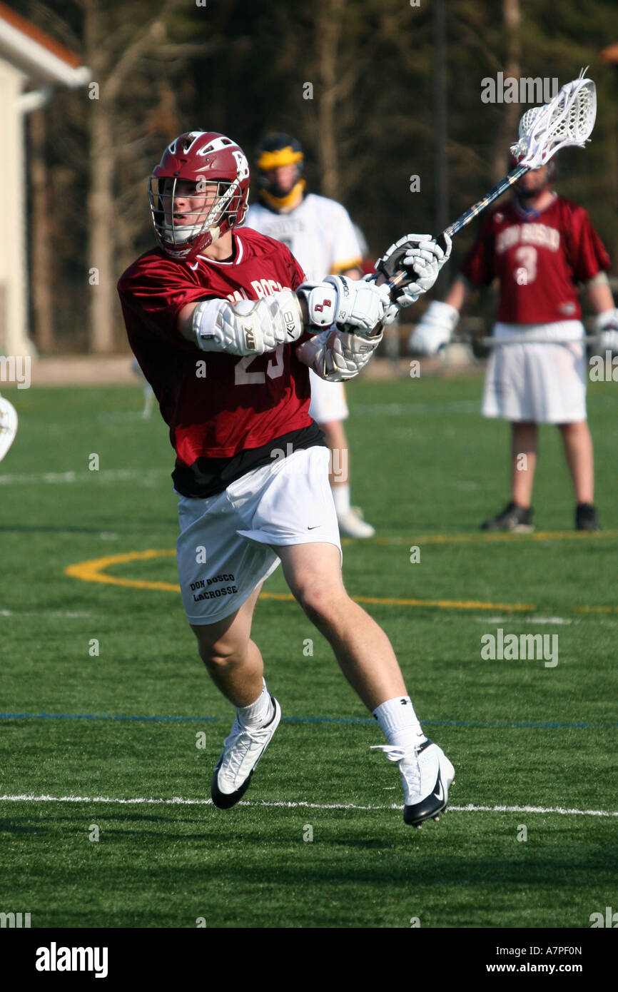 Lacrosse player throws the ball Stock Photo Alamy
