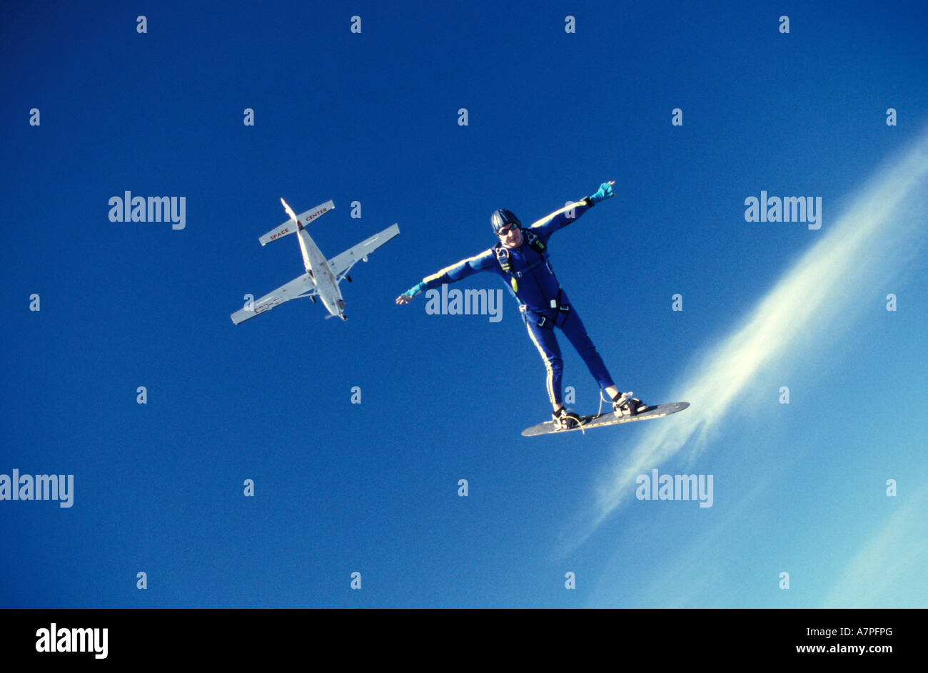 Solo sky surfer with plane in the background Stock Photo