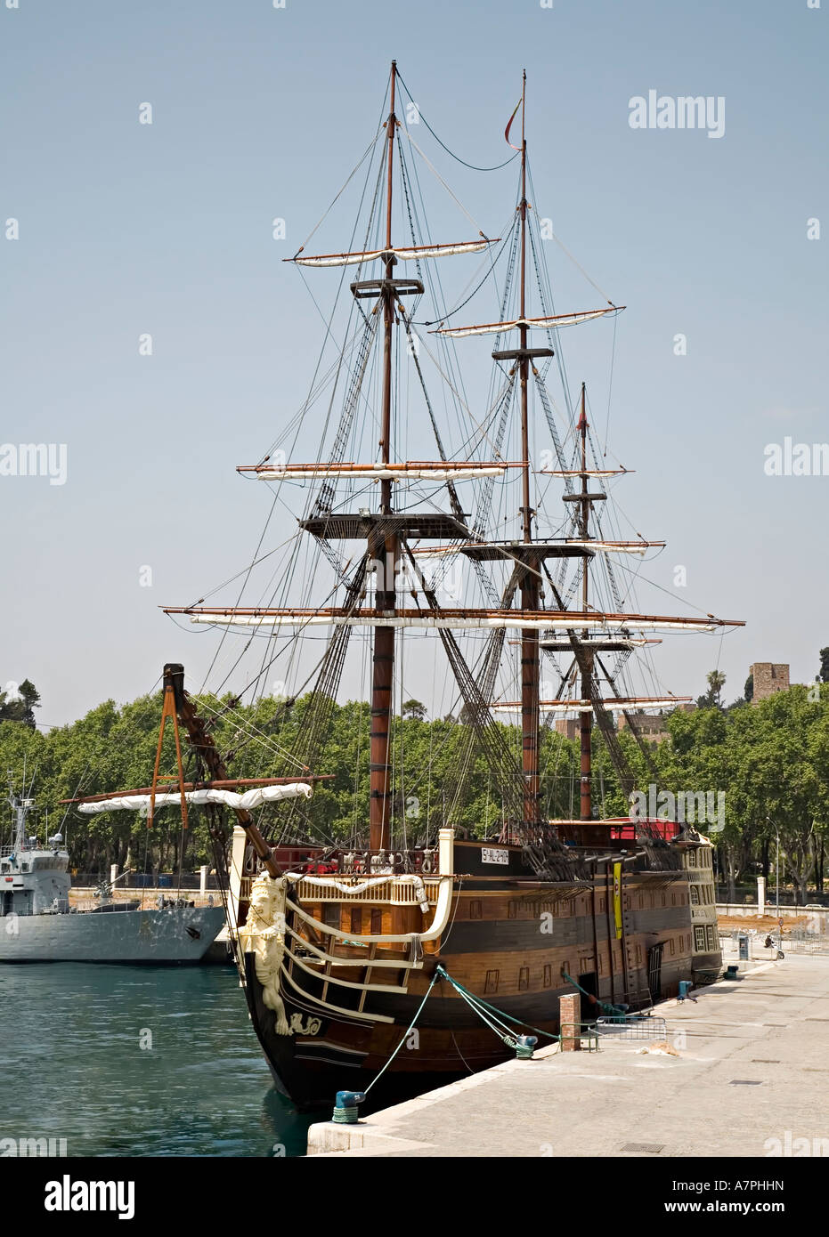 Spanish galleon Santisima Trinidad moored in harbour with Alcazaba in distance Malaga Spain Stock Photo
