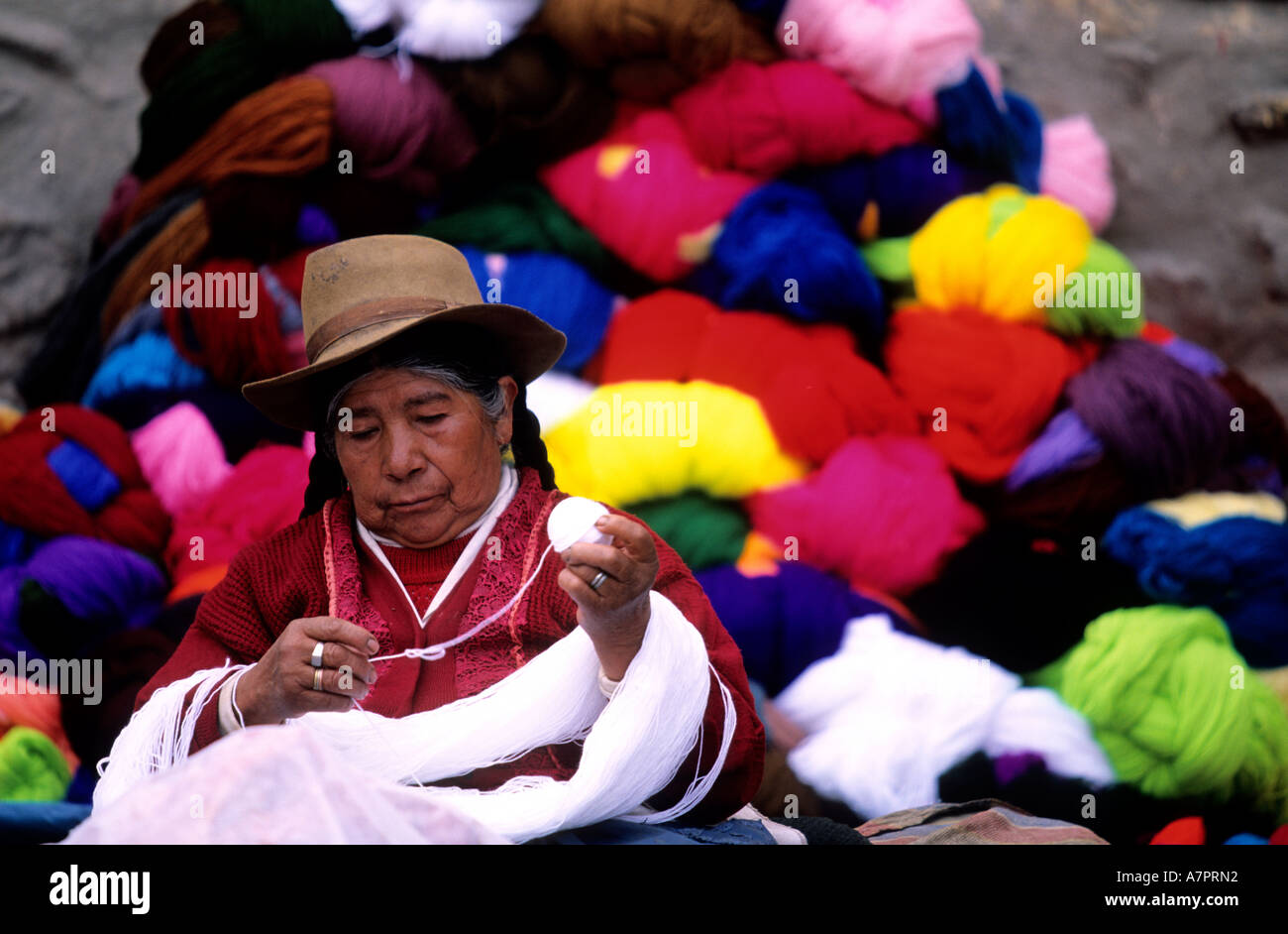 Peru, Cuzco Department, the Sacred Valley, Pisac, a saleswoman of wool on market Stock Photo