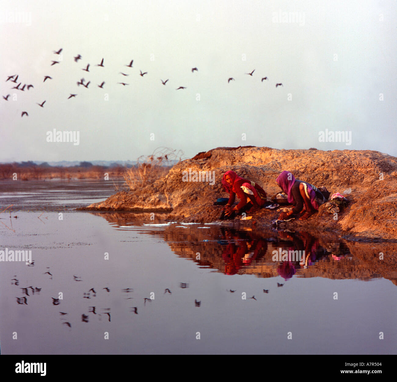 Women washing in river hi-res stock photography and images - Alamy