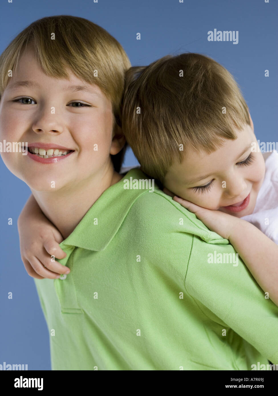 Woman Giving Little Boy Piggyback Ride Stock Photo, Picture and Royalty  Free Image. Image 10112006.