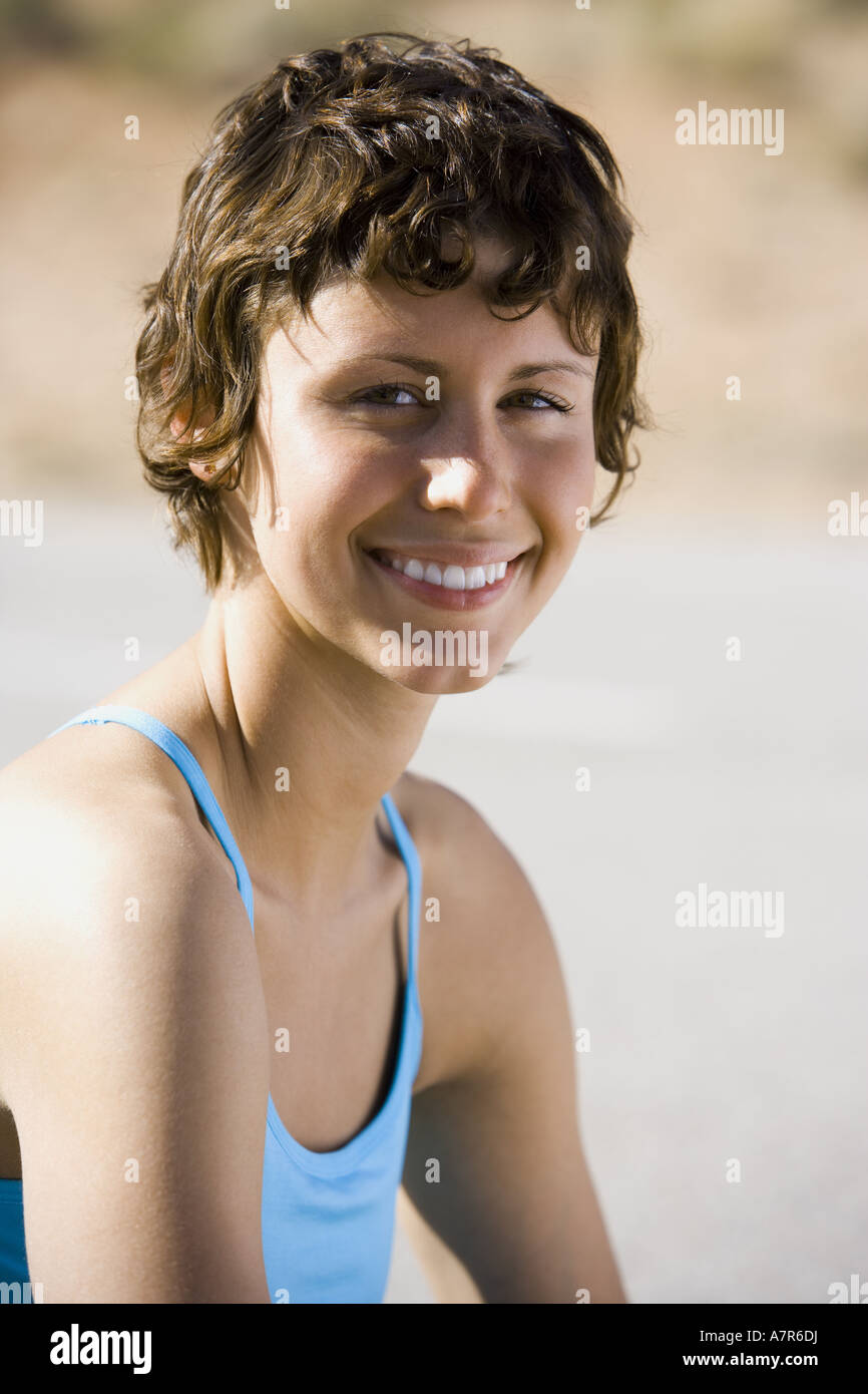 Portrait of a woman smiling outdoors Stock Photo - Alamy