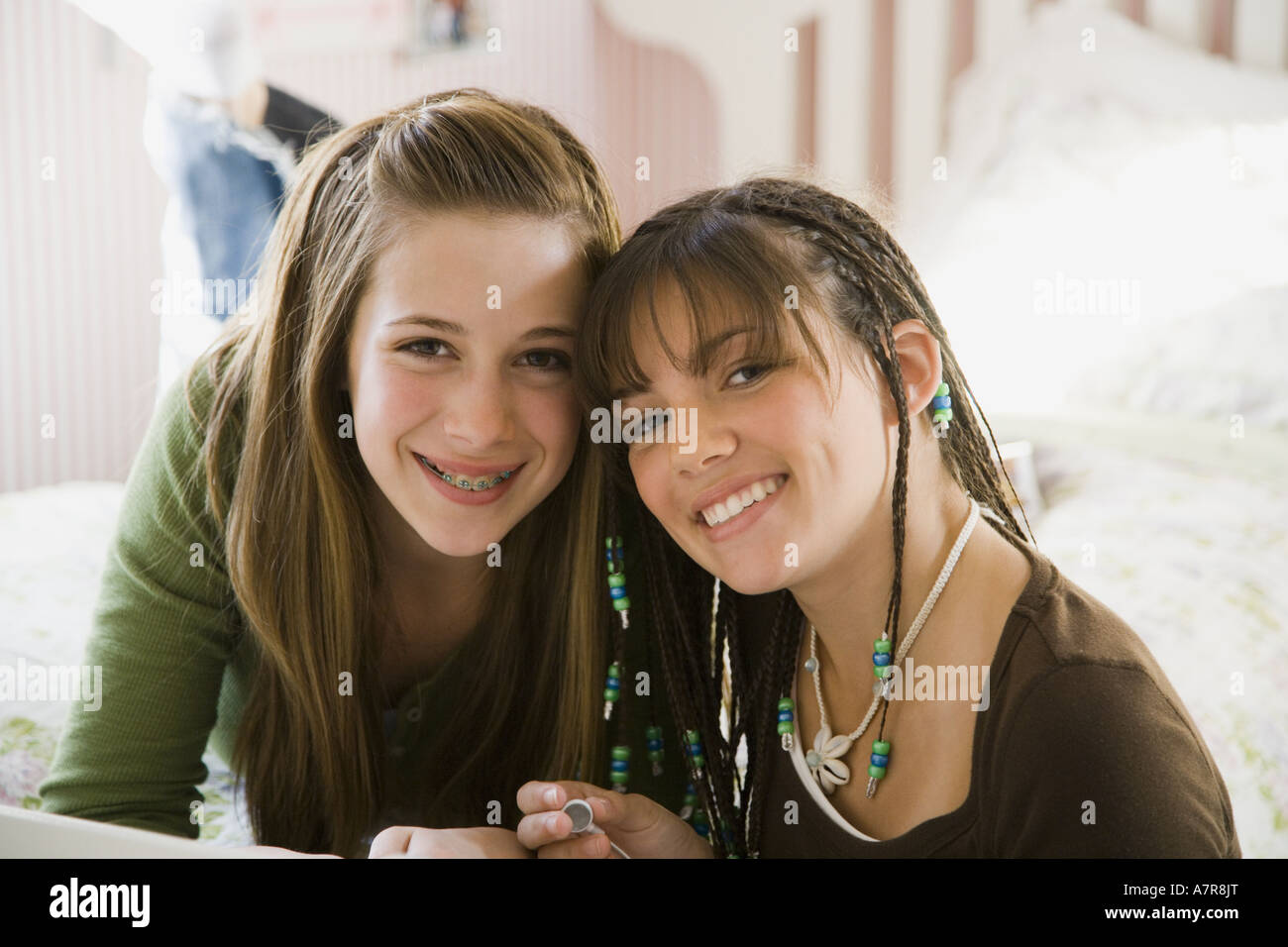 Portrait of two girls smiling Stock Photo - Alamy