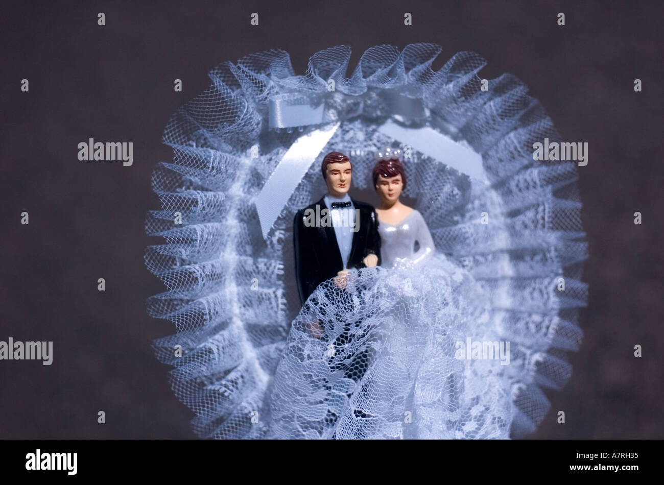 Bride and groom wedding cake topper wedding concept Stock Photo - Alamy