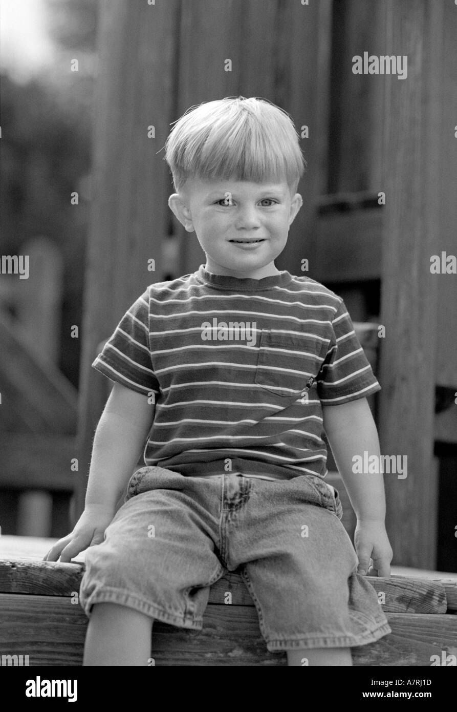 Small boy with smile portrait in black and white Stock Photo Alamy