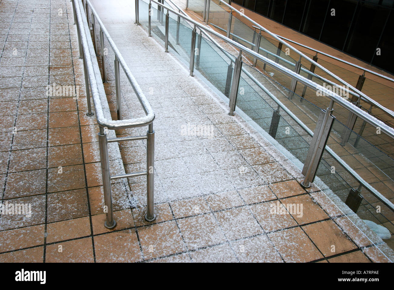 Walkway covered in snow and ice Stock Photo Alamy