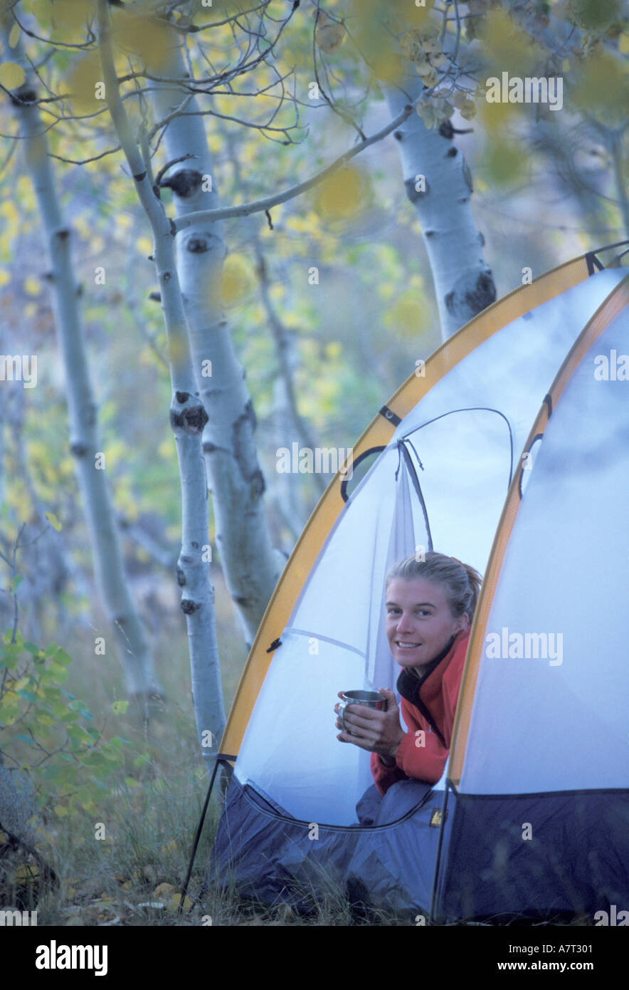 Woman happy camping tent hi-res stock photography and images - Alamy