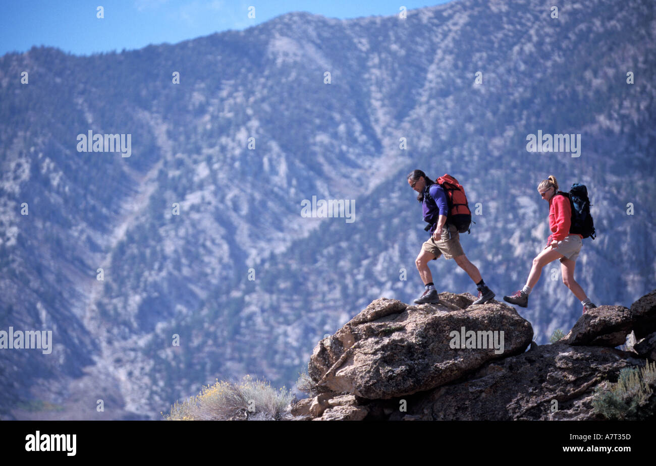Strong man backpack hiking hi-res stock photography and images - Alamy