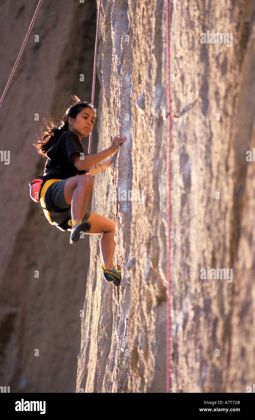 Strong woman climbing rock hi-res stock photography and images - Alamy