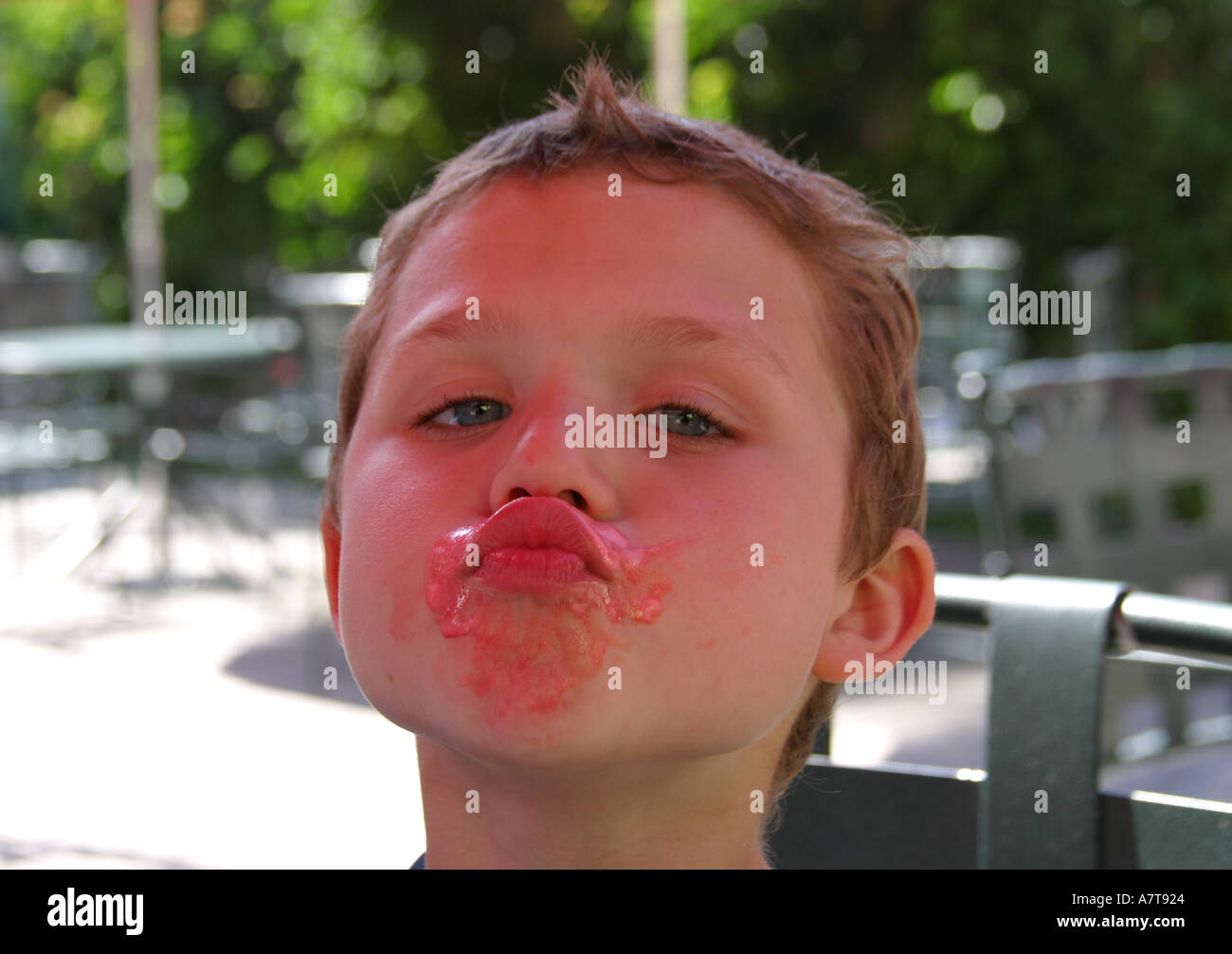 Boy with sticky ice cream on face Stock Photo Alamy