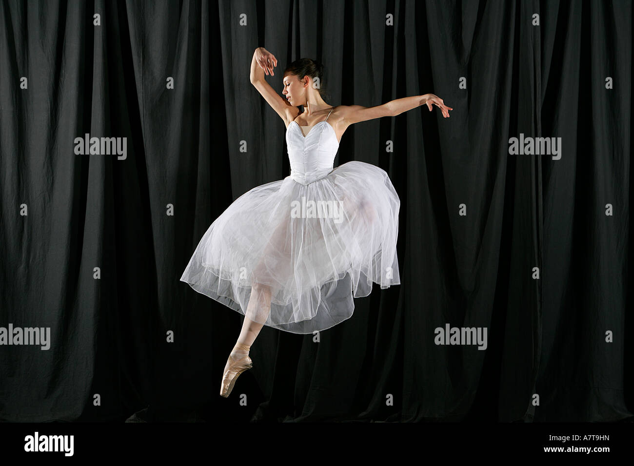 Ballerina leaping dance show performance Stock Photo - Alamy