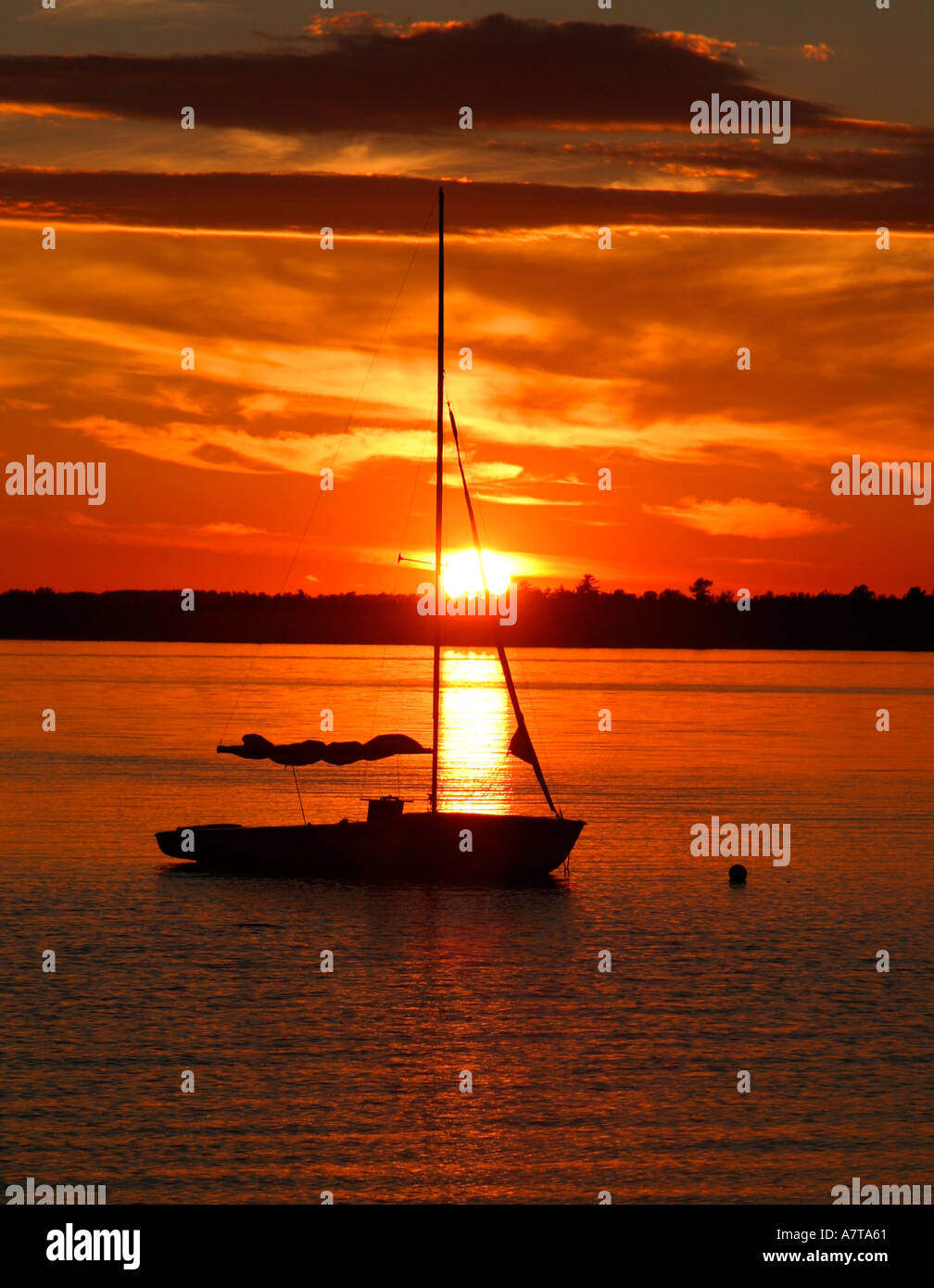 Silhouetted Yacht in golden sunset L Isle aux Allumettes Quebec Canada near  Pembroke Ontario Stock Photo - Alamy