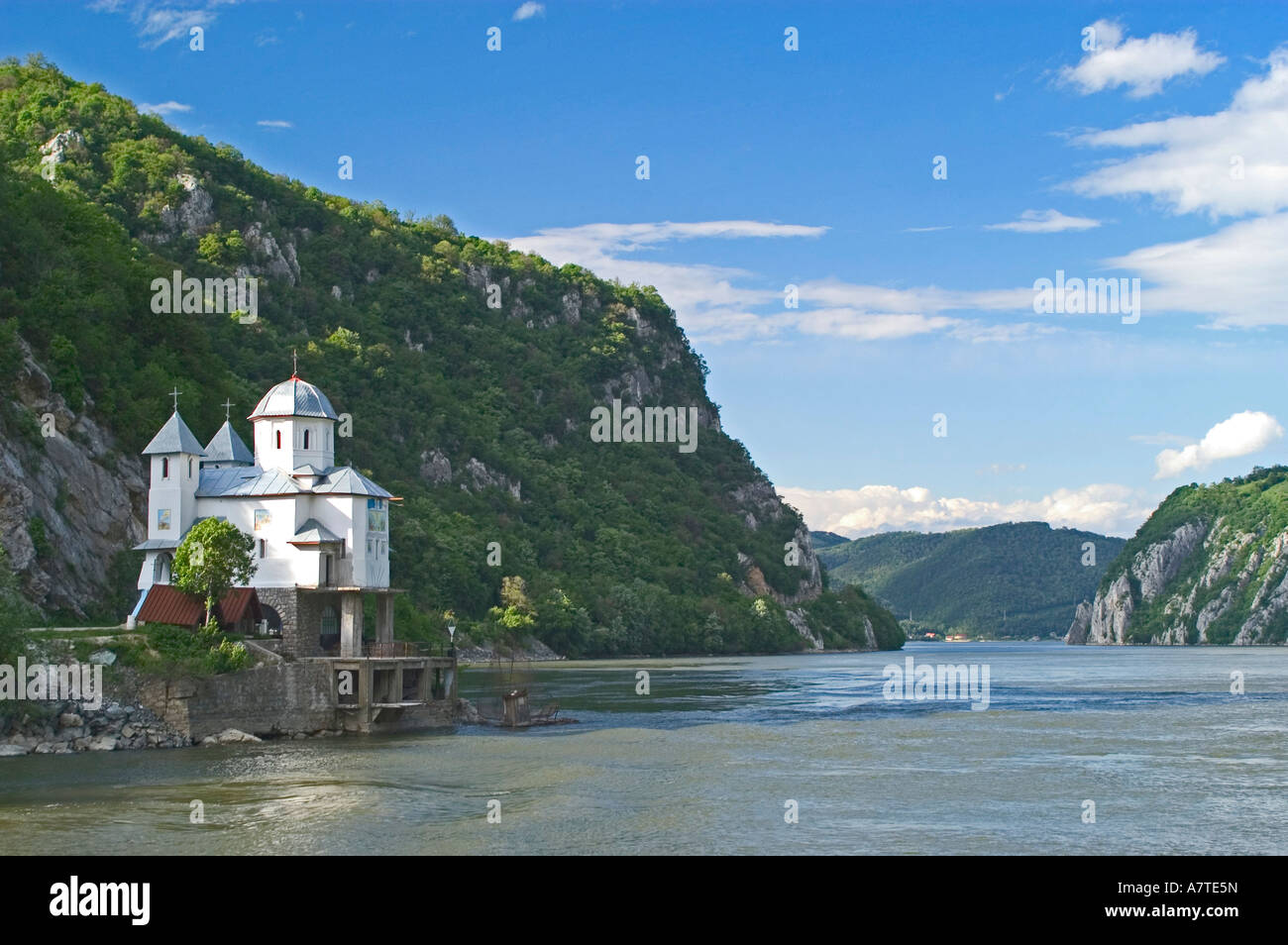 Church at riverbank, Danube river, Romania Stock Photo