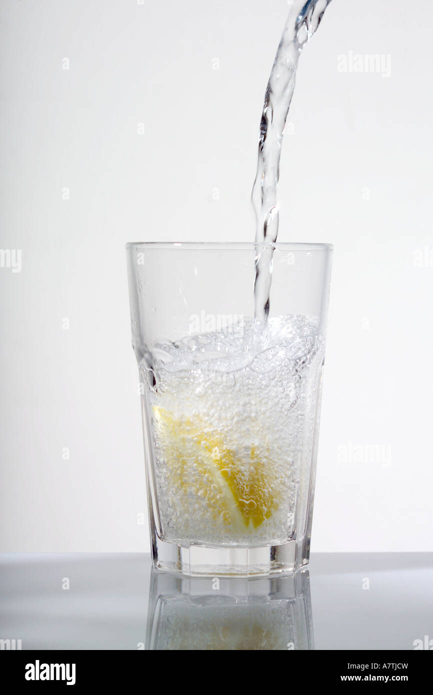 Closeup of water being poured into glass Stock Photo Alamy